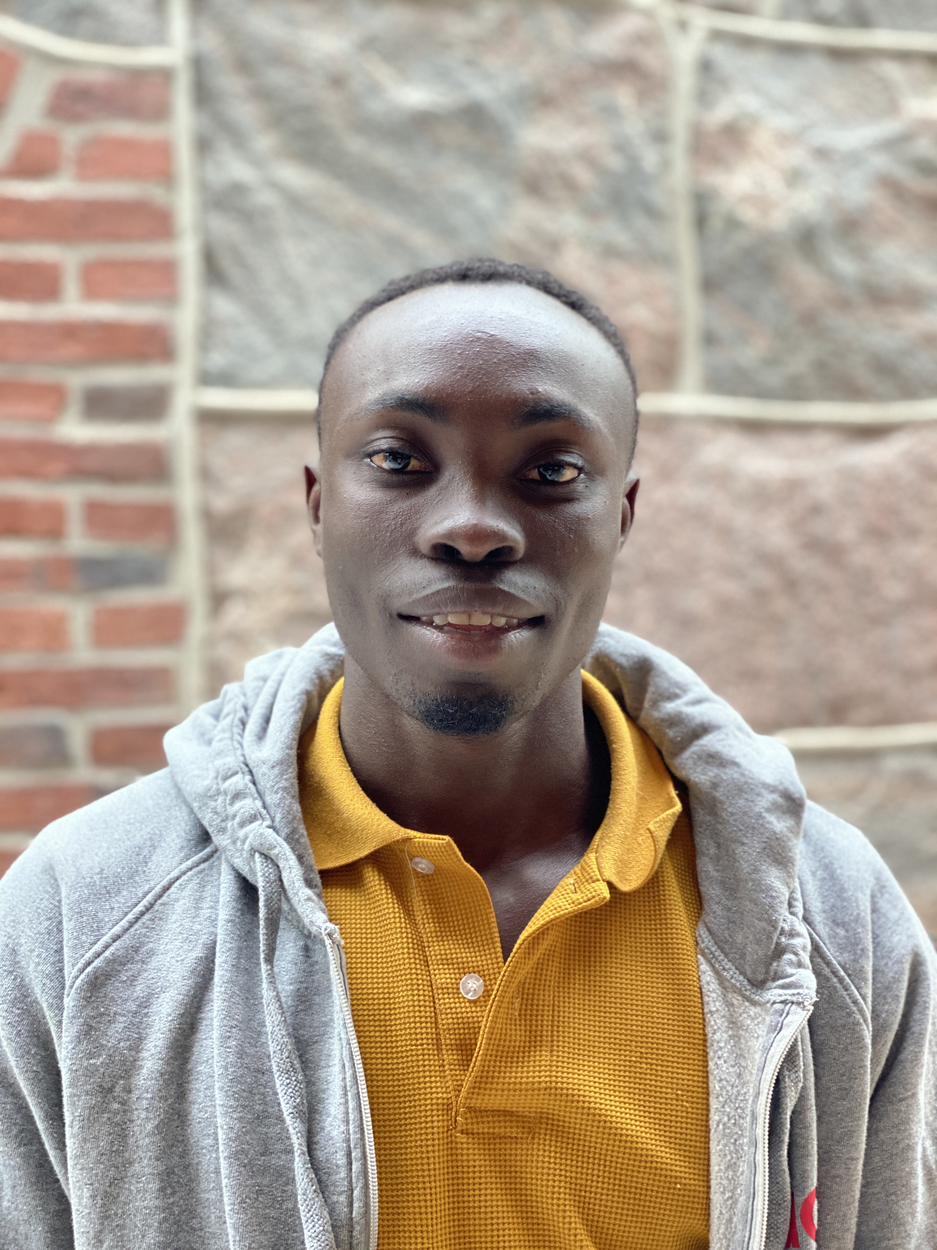 Porträttbild av Datius från Tanzania, som gjort utbytesprogrammet ung i den världsvida kyrkan.